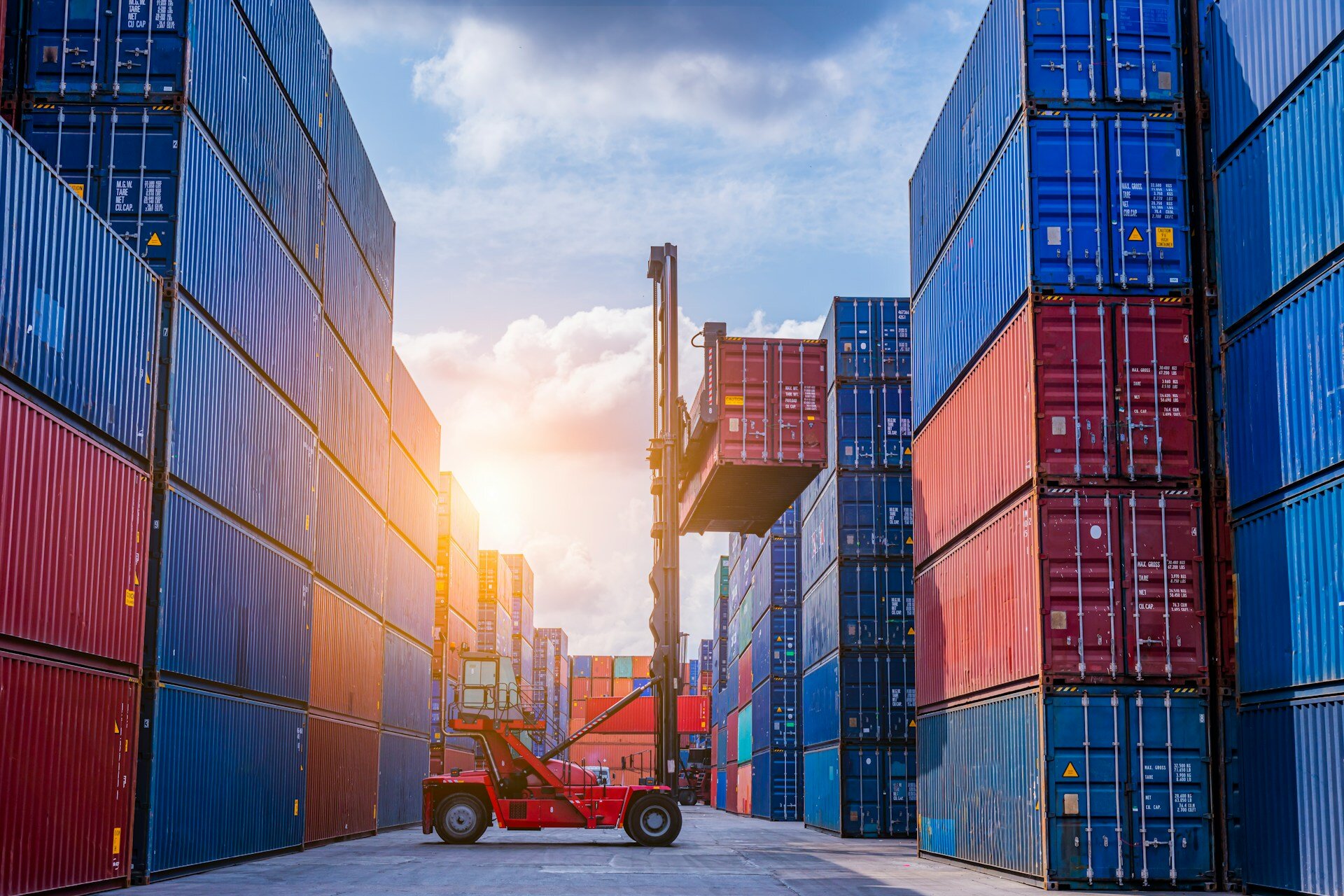 A picture of a person handling a forklift